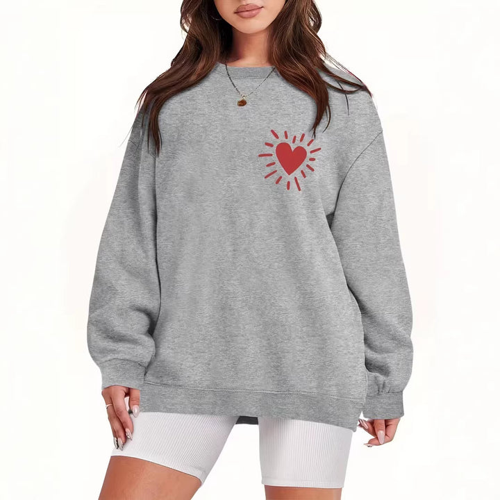 Kvinders sweatshirt med afslappet hjertemotiv og oversized pasform Skovae