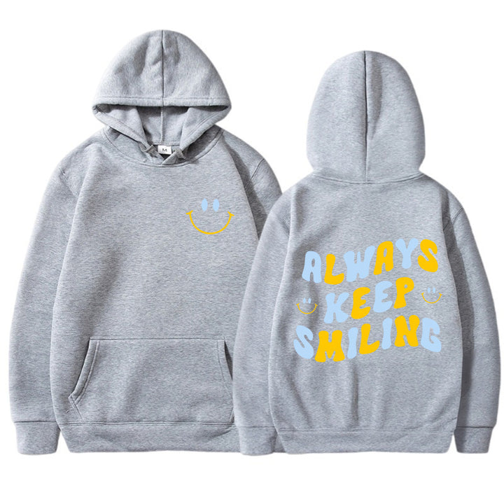 Dame hoodie med munter skrift og praktiske kangaroo lommer Skovae