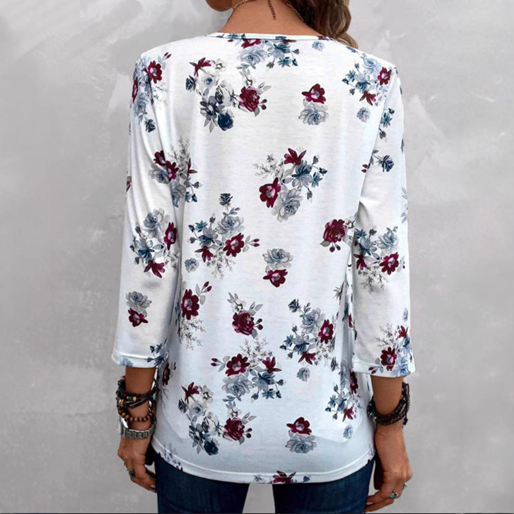 Kvinders bluse med blomsterprint og knapdetaljer Stilla