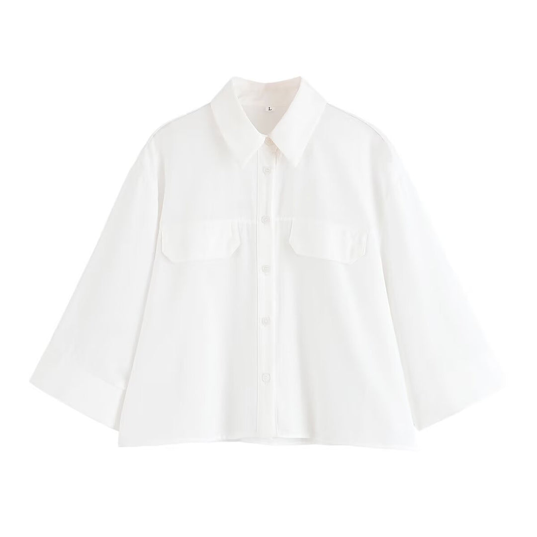 Dame stribet bluse med oversized pasform og praktiske lommer Stilla
