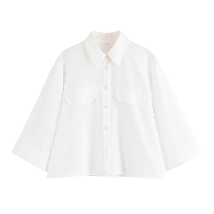 Dame stribet bluse med oversized pasform og praktiske lommer Stilla