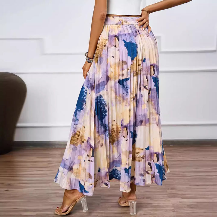 Dame maxi nederdel med plisserede detaljer og blomsterdesign Stilla