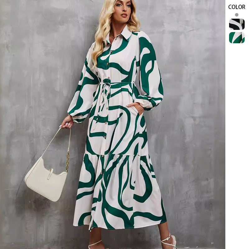 Damekjoler med lange ærmer med sofistikeret grafisk design og elegant bælte.