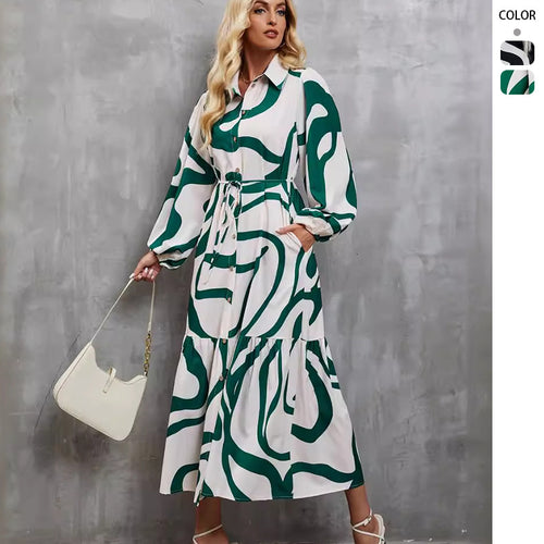 Damekjoler med lange ærmer med sofistikeret grafisk design og elegant bælte.
