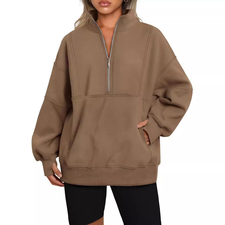Dame Sporty Hoodie med halvdelen lynlås og voluminøse ærmer Stilla