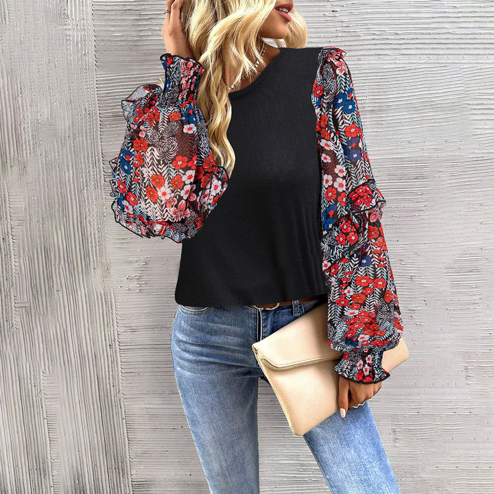 Damebluse med florale flæsedetaljer og elastiske ærmer Stilla