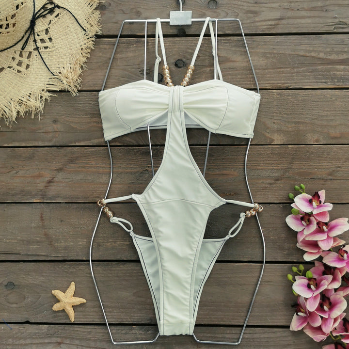 Dame one-piece badedragt med unikt cut-out design og glamorøse dekorationer Stilla