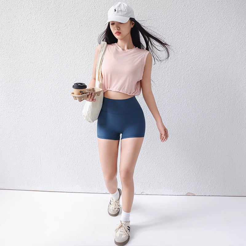 Dame Sporty Cropped-Top med bred rund halsudskæring og luftige egenskaber Stilla