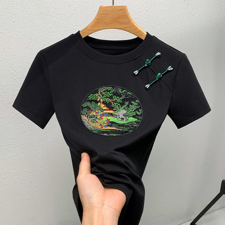 Dame T-shirt med kunstnerisk broderedesign og dekorative applikationer Stilla
