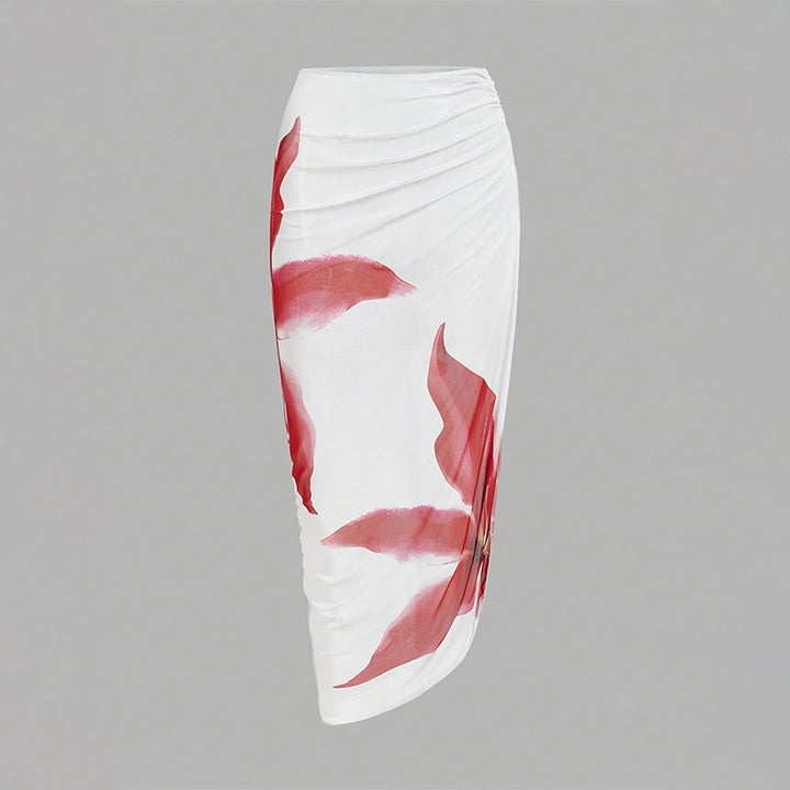 Dame one-piece badedragt med elegant blomsterapplikation og draperet skørt Skovae