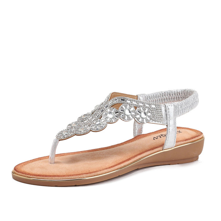 Dame flip-flops med glitrende smykkedetaljer og komfortabel fodseng Stilla