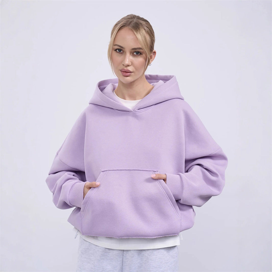 Dame oversized hoodie med kængurulomme og elastiske manchetter