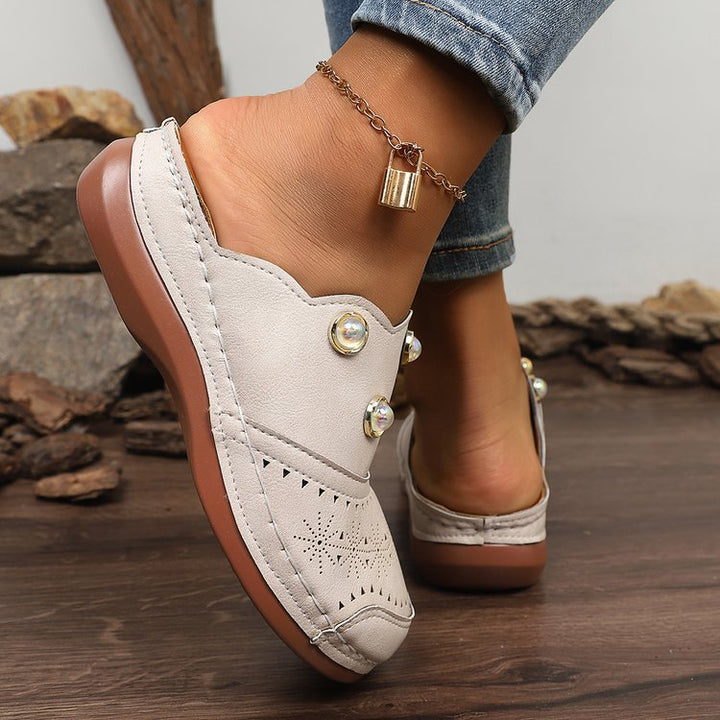 Dame Slip-On Clogs med Modeperforering og Elegante Dekordetaljer Stilla