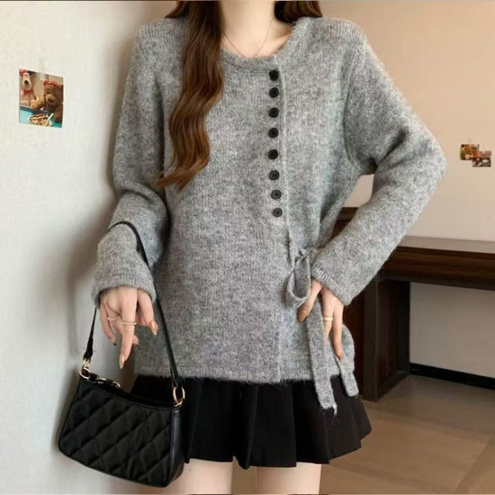 Kvinders stilfulde cardigan med fashionable knapdetaljer og bælte Stilla