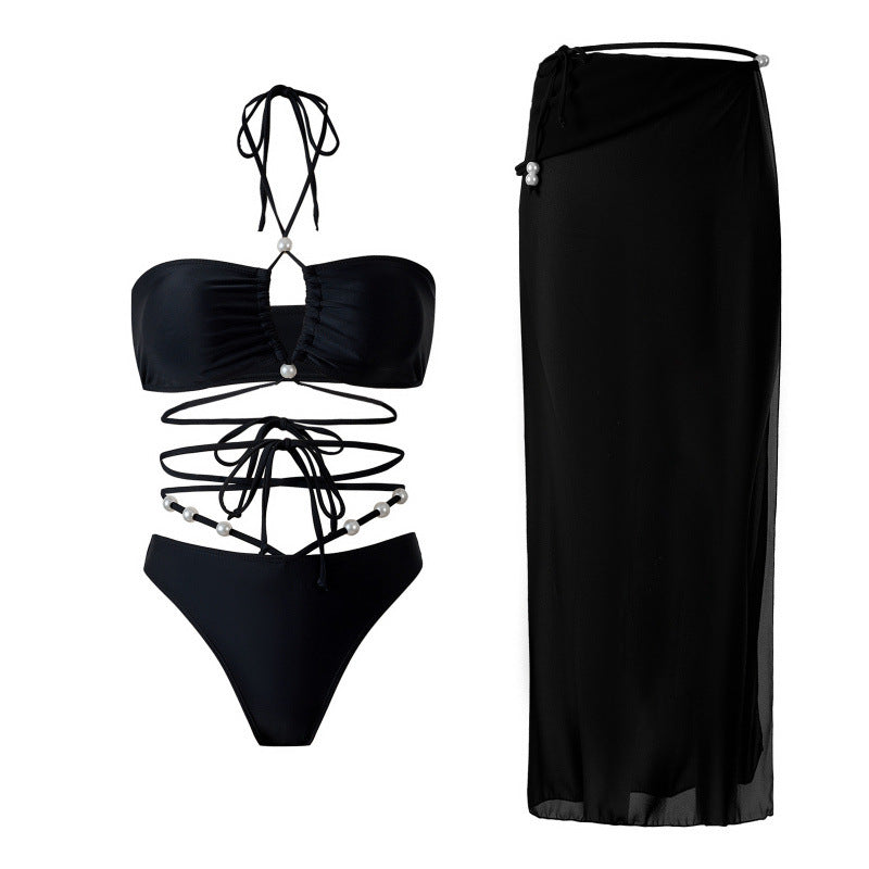 Dame bikini-sæt med fashionabel cut-out-design og elegant omslagsskjørt Skovae