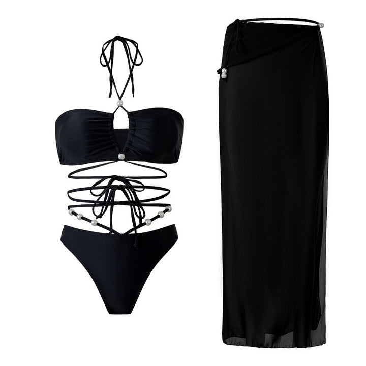Dame bikini-sæt med fashionabel cut-out-design og elegant omslagsskjørt Skovae