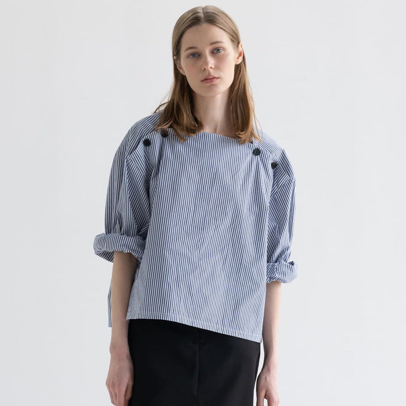 Kvinders fashionable bluse med innovative knapdetaljer Stilla