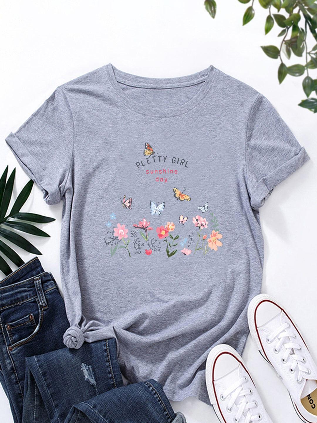 Kvinders t-shirt med legende blomsterprint og elegant print Stilla
