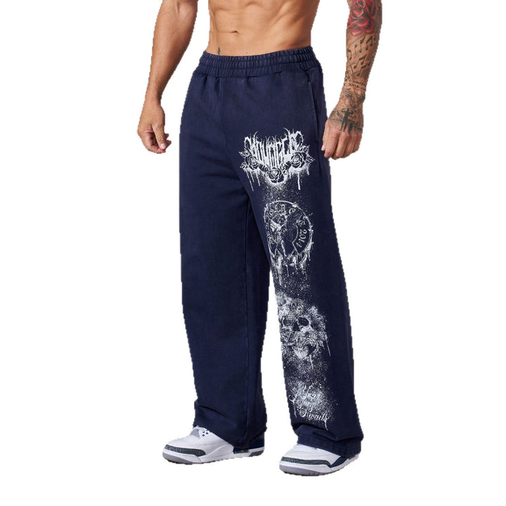 Herrer nan brede joggingbukser med elastisk talje, sidelommer og detaljeret kranium- og rosenmotiv Skovae