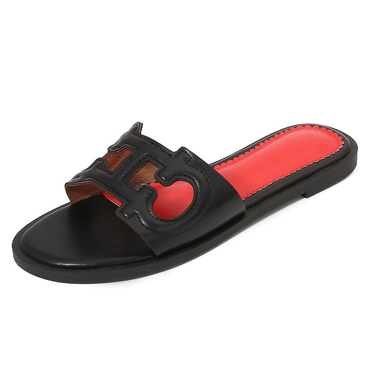 Dame mode slippers med iøjnefaldende logo Stilla