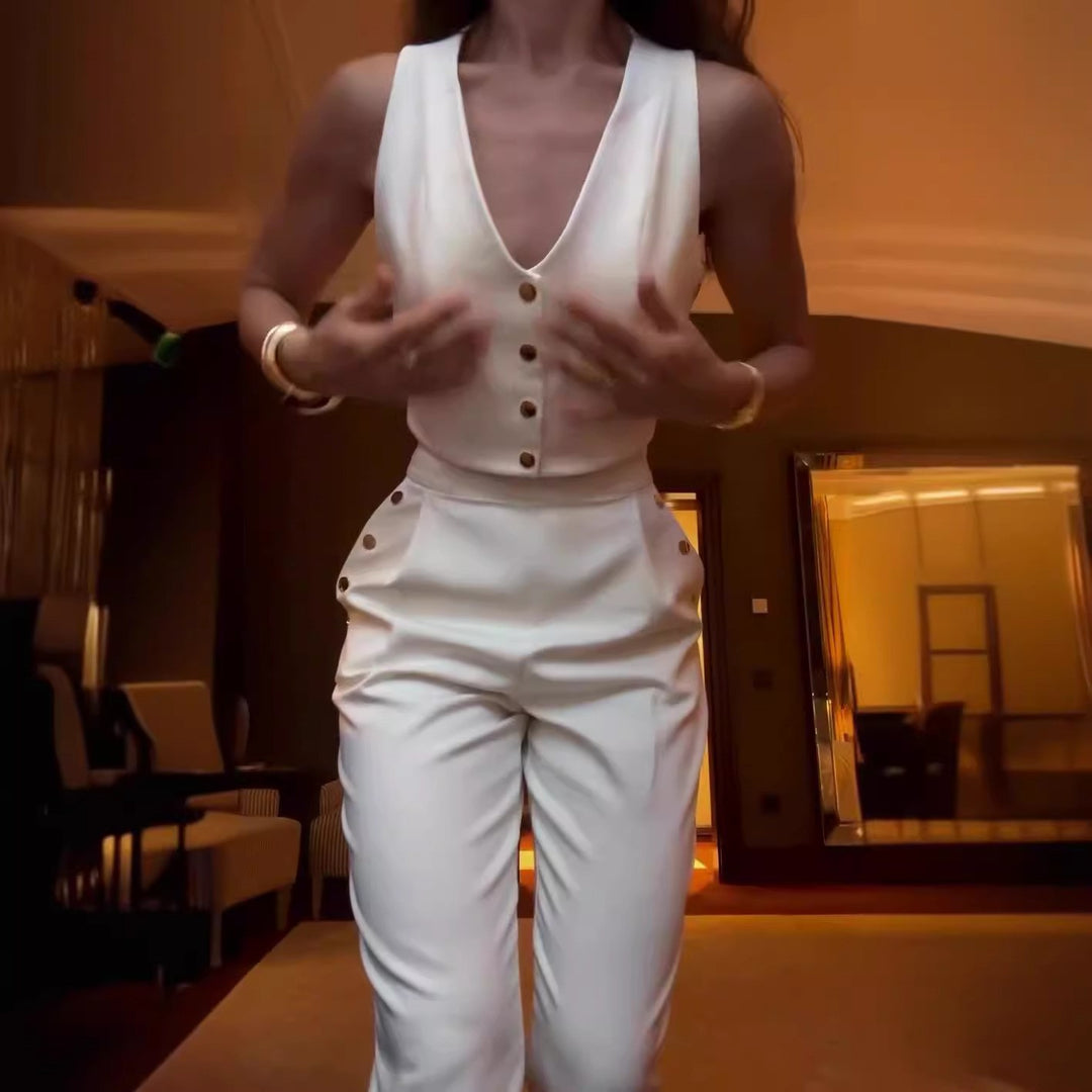 Dame crop-top med elegante knapper og højtaljede bukser Stilla