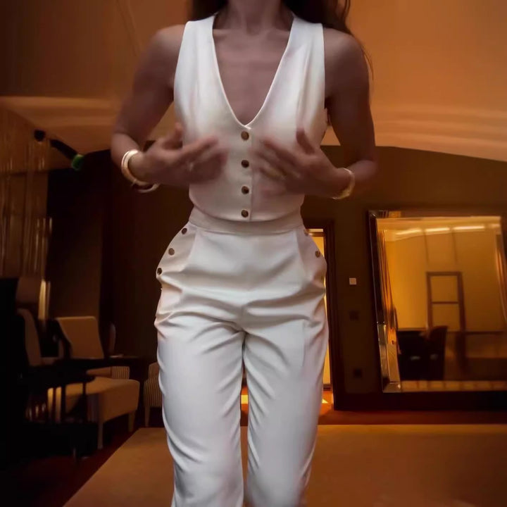 Dame crop-top med elegante knapper og højtaljede bukser Stilla
