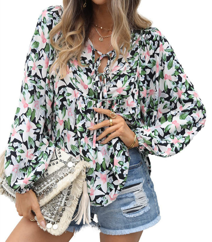 Damebluse med blomsterdesign og luftige ærmer Stilla