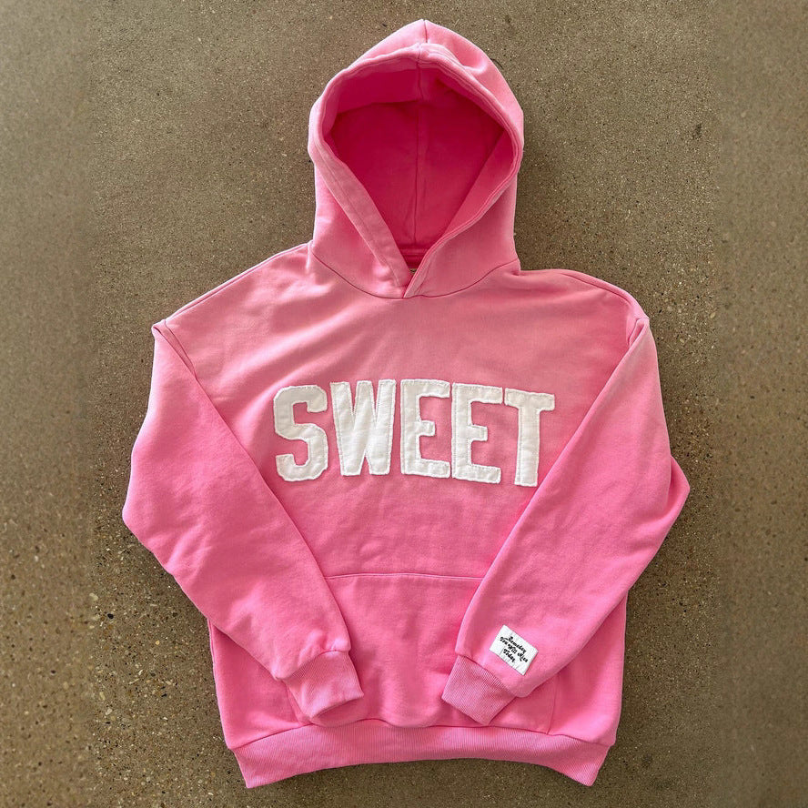 Unisex nan weit gesnit hoodies med påsyede bogstaver og kængurulomme Skovae