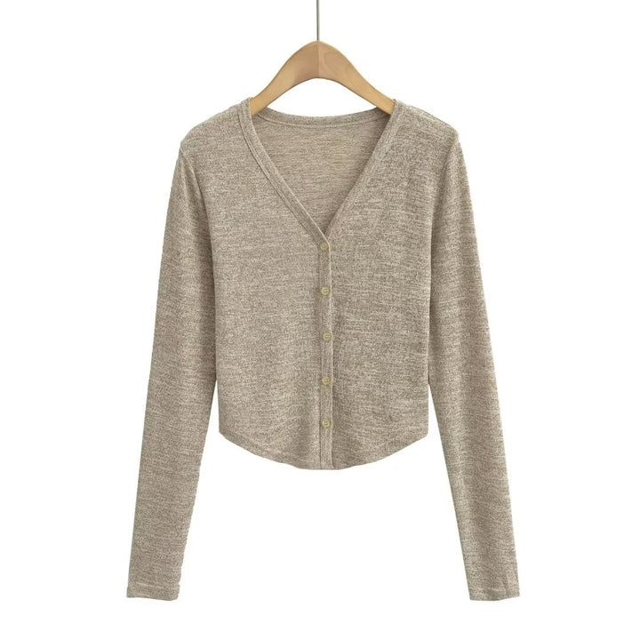Dame kortærmet cardigan med fint strukturdesign og knapdetaljer Stilla
