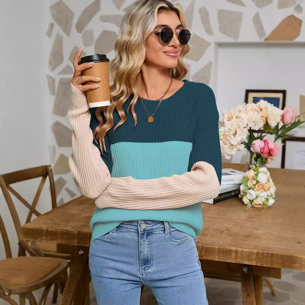 Dame strikket sweater i fashionable farveblok design Stilla