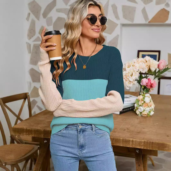 Dame strikket sweater i fashionable farveblok design Stilla
