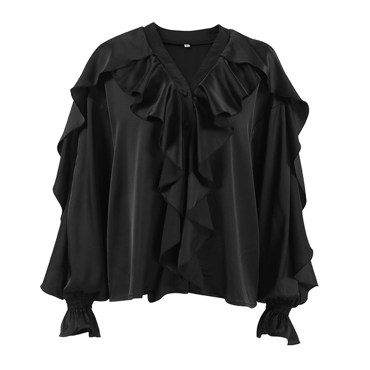 Damebluse med voluminøse flæser og elegante ærmer Stilla