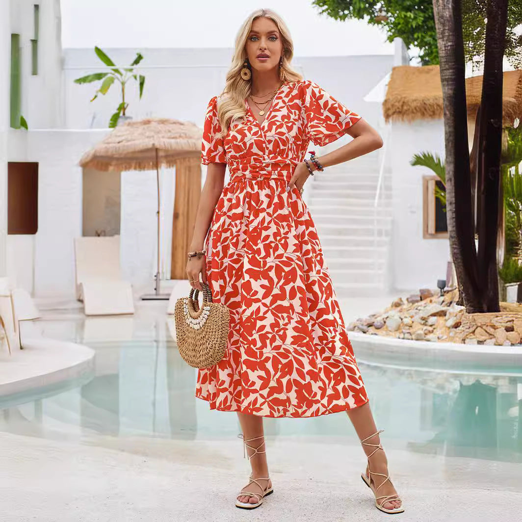 Dame maxikjole med blomstret print og figursyet design Stilla
