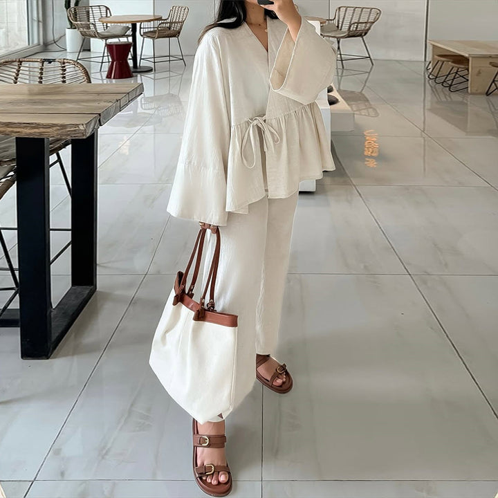 Dame elegant og afslappet lounge-sæt med oversized bluse og flydende bukser Stilla