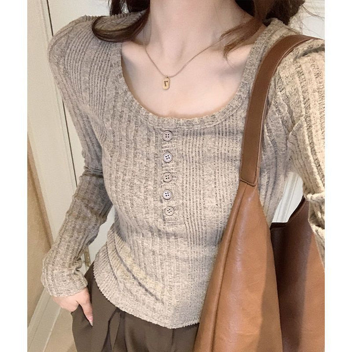 Kvinders tætsiddende langærmet sweater med knopdetaljer Stilla