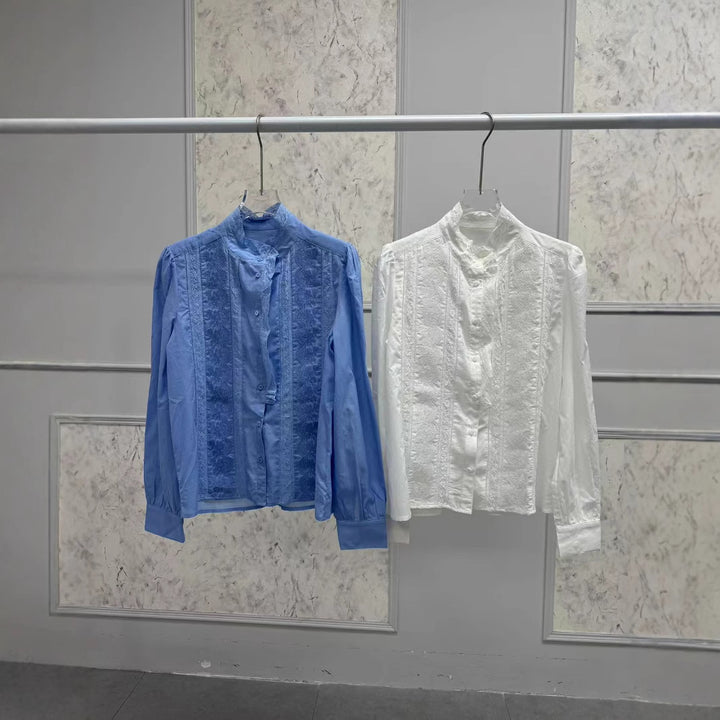 Damebluse med elegante spidsdetaljer og casual snit Stilla