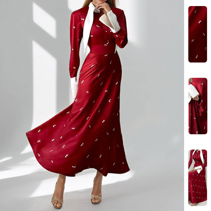 Kvinders elegante maxikjole med kunstnerisk drapering og lange ærmer Stilla