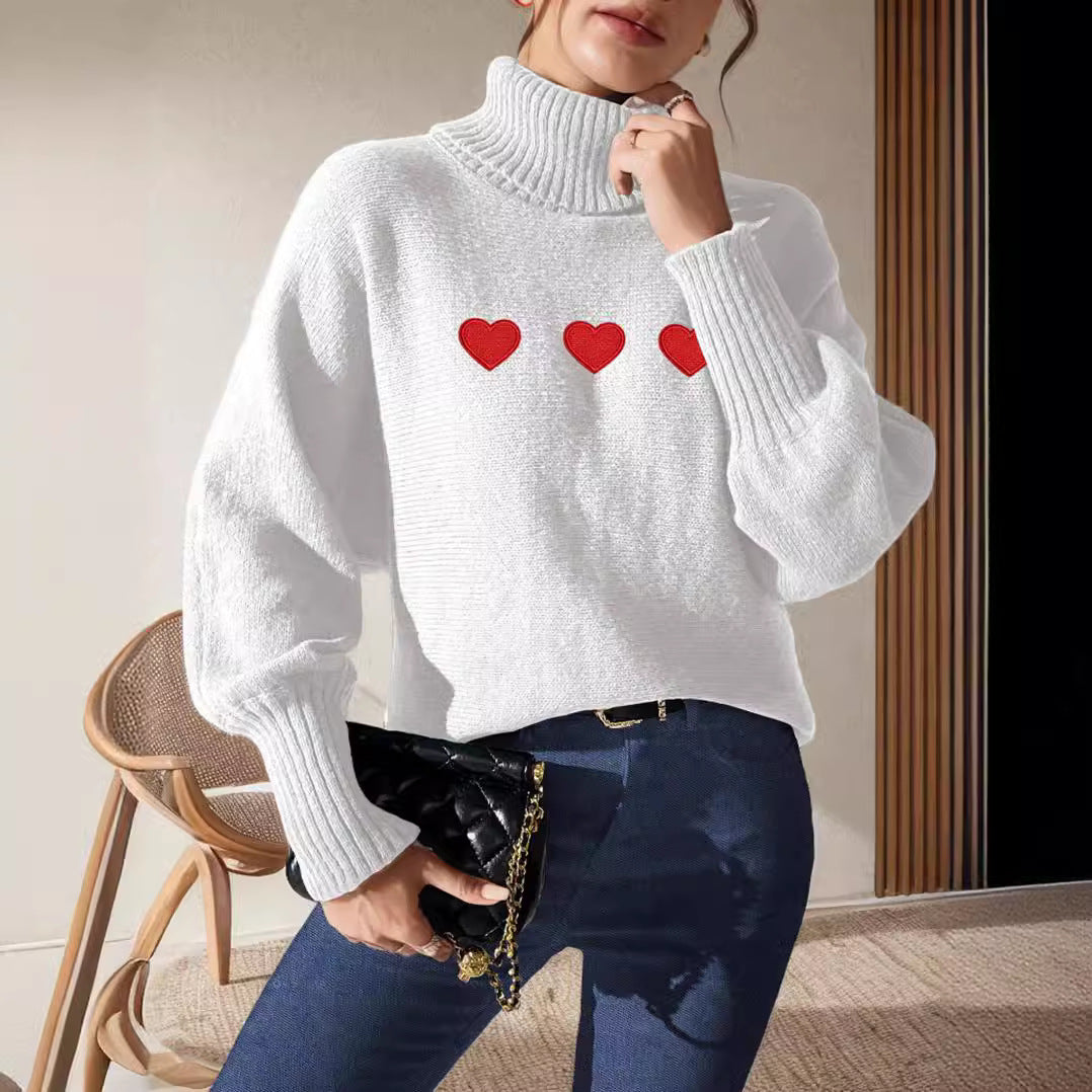 Kvinders sweater med høj krave og legende hjerteapplikationer Stilla
