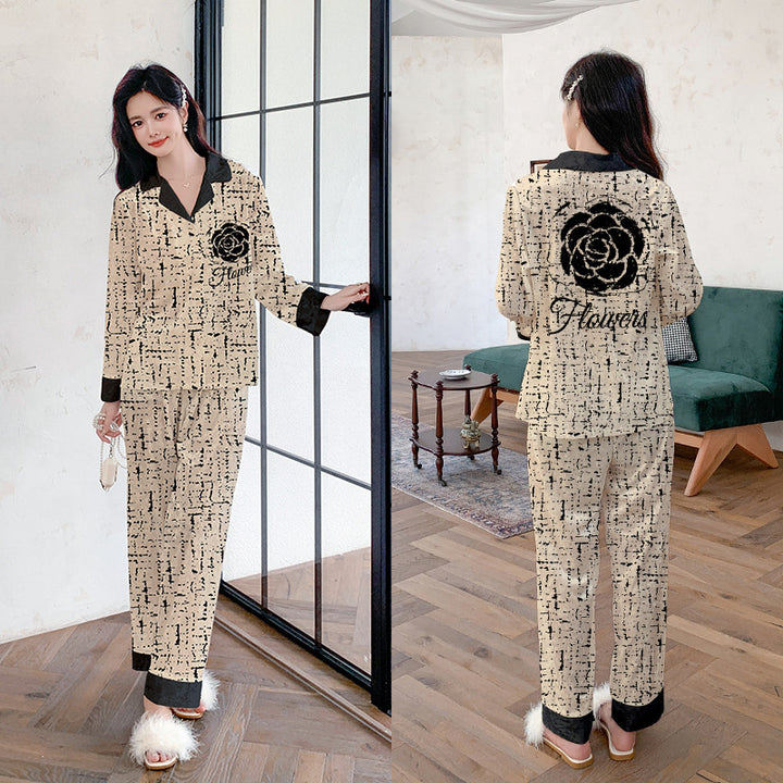 Dame luksus natwear sæt med blomstermønster og elegant design Stilla