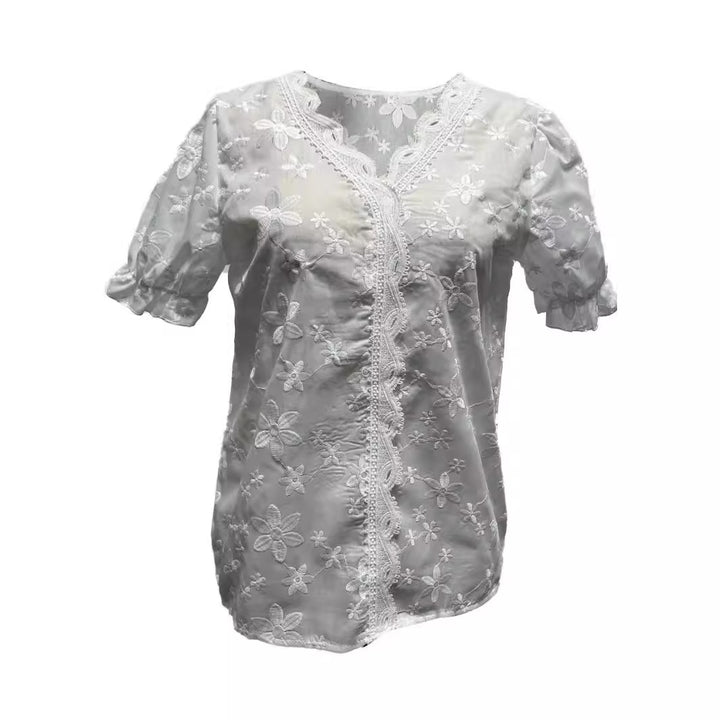 Damebluse med romantisk blomsterdesign Stilla