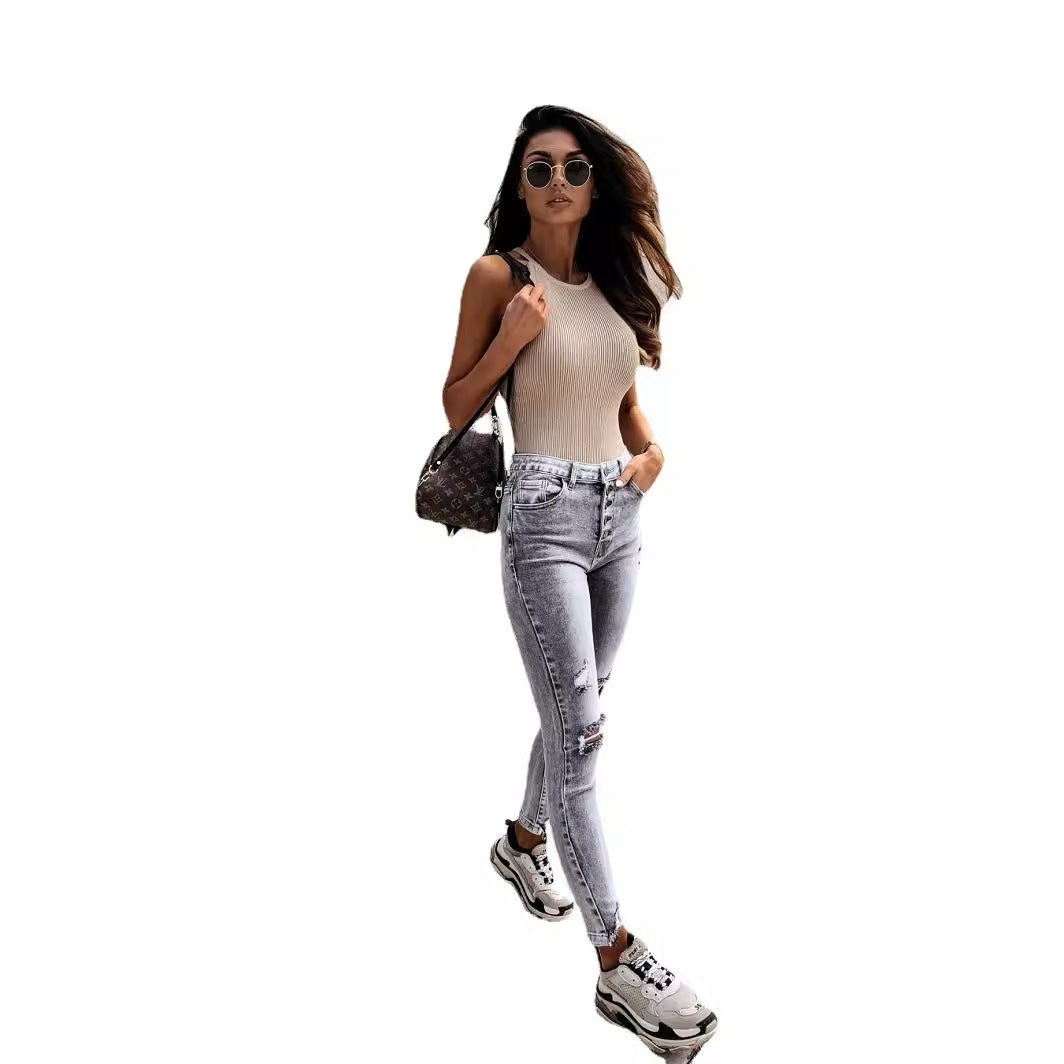 Dames skinny jeans med høje lommer og trendy slidte detaljer