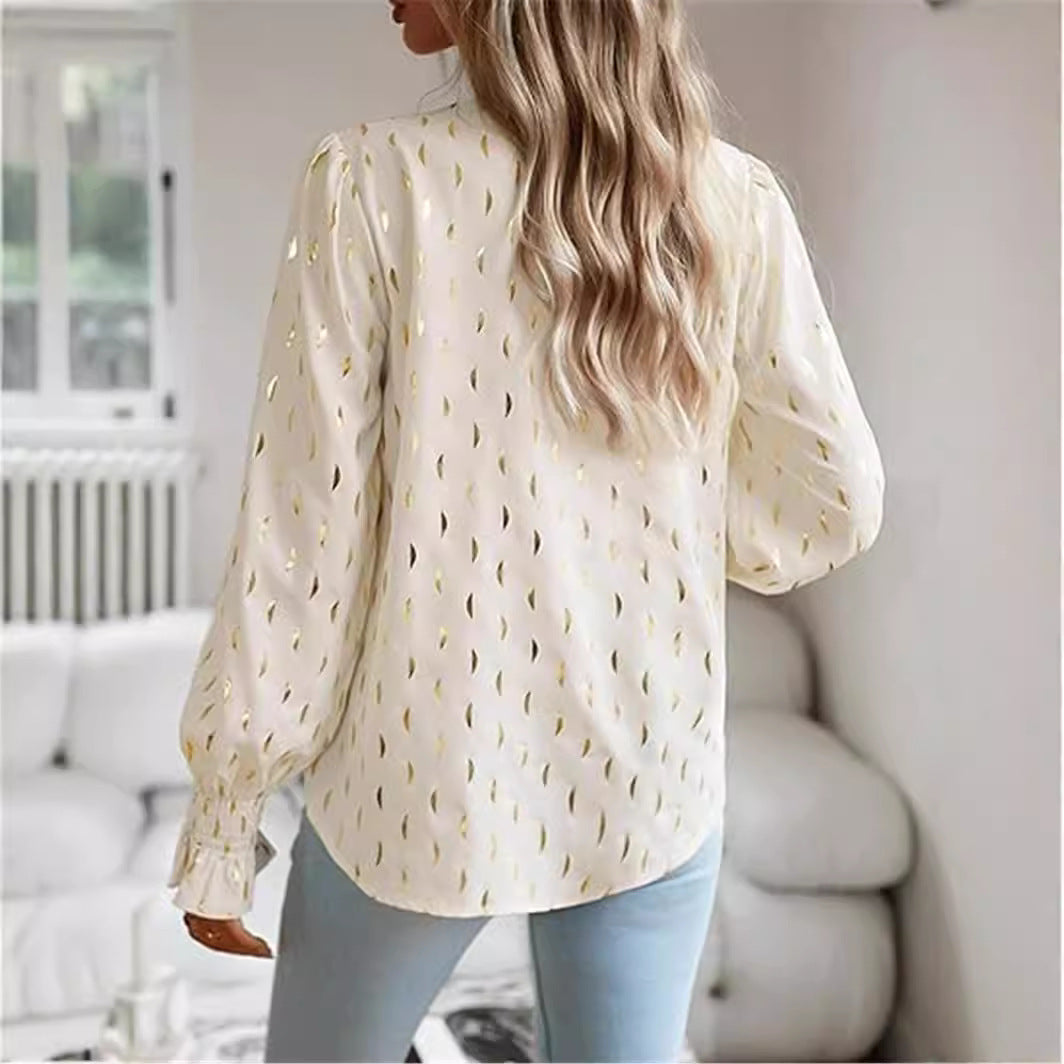 Damebluse med elegant guldmønster Stilla