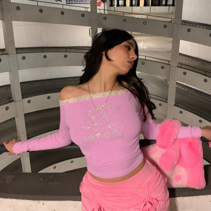 Dame Off-Shoulder Crop-Top med spidsede accenter og glimmerdetaljer Stilla