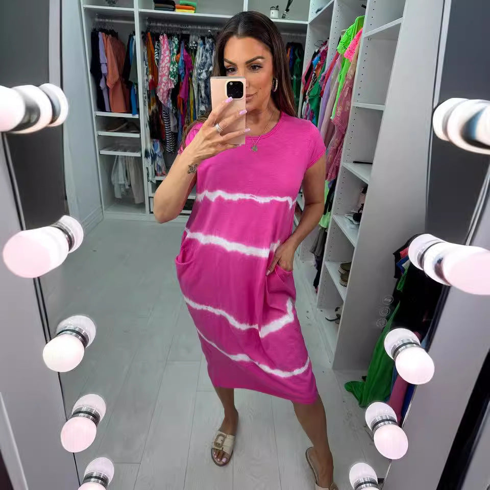 Dame fritidkjole med praktiske lommer og moderne batiklook Stilla