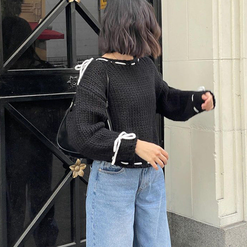 Kvindernes afslappede strikket sweater med åbne skuldre og snøre detaljer Stilla