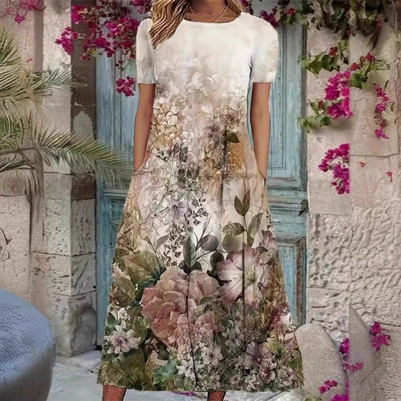 Damer Elegant Maxikjole med blomsterdesign og delikat rund halsudskæring Skovae