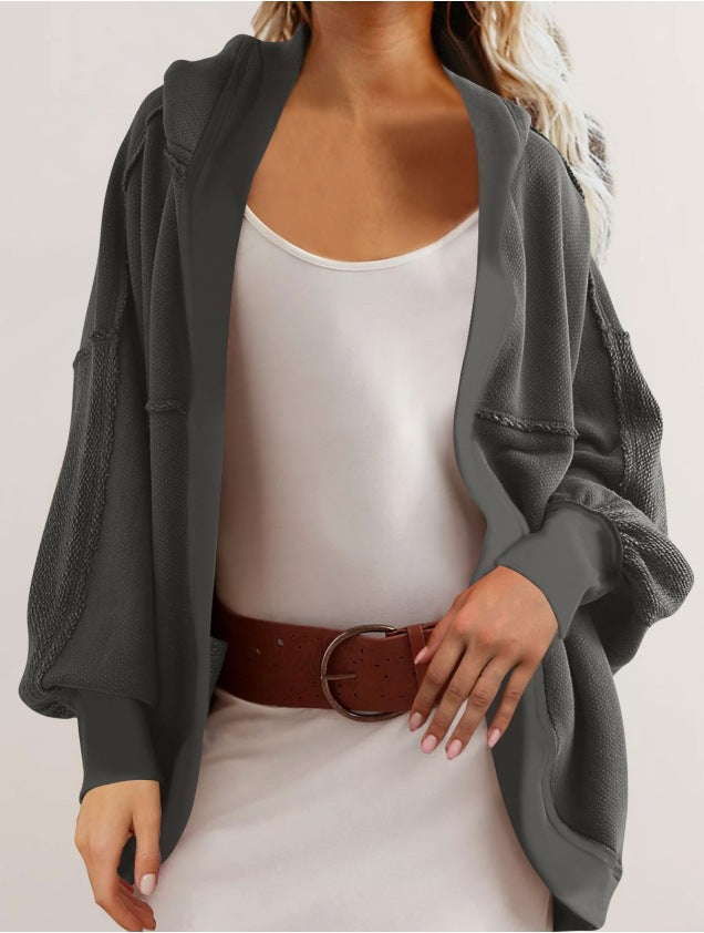 Dame casual oversized hoodie med åben front og luftige ærmer Stiila