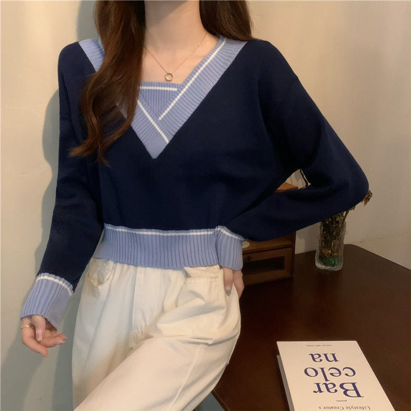 Damer modevenlig V-hals sweater med kontrastdetaljer Stilla