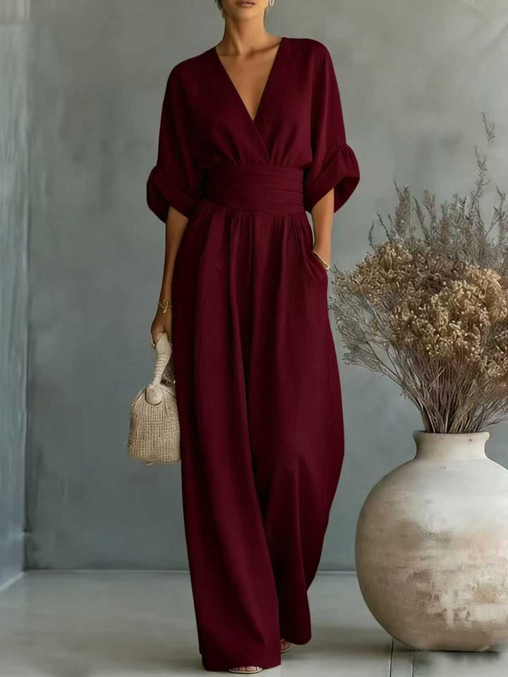 Dame jumpsuit med elegant V-udskæring og bredt ben Skovae