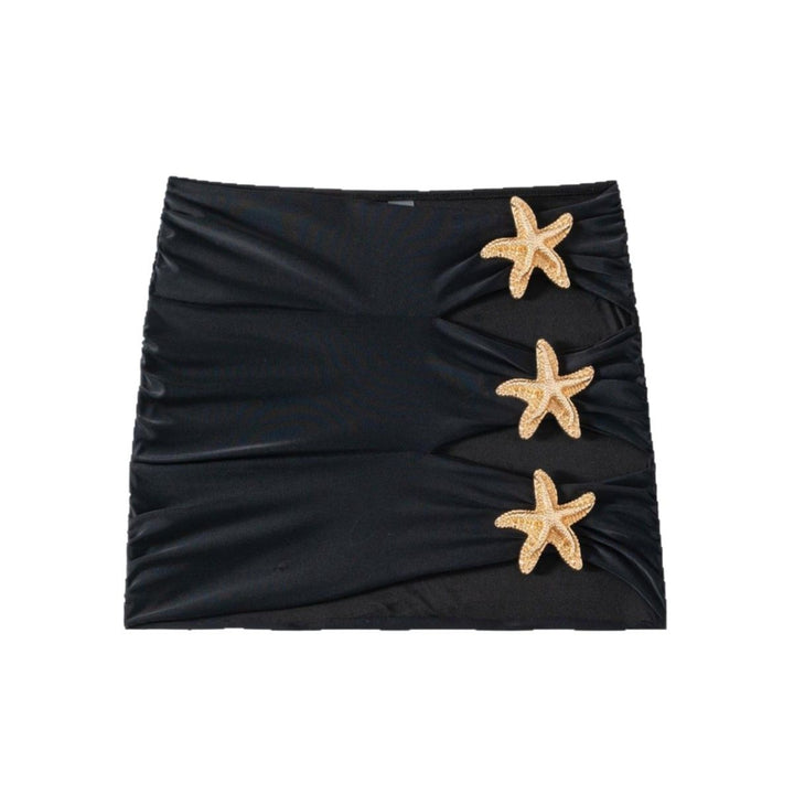 Dame Strandkjole med elegante Cut-Outs og glimrende muslingedetaljer Skovae